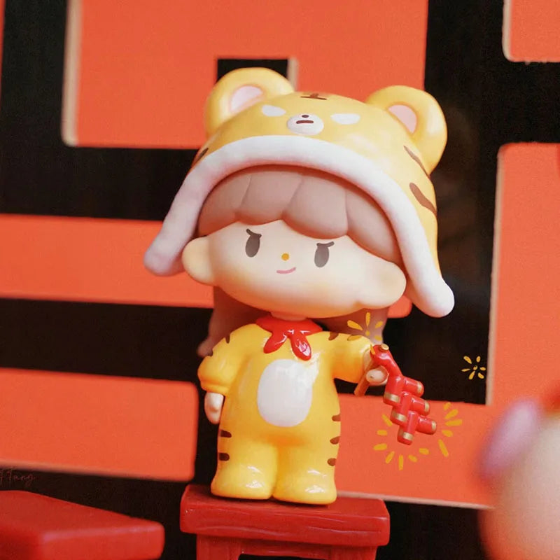 Toy figure of a character in a tiger costume with a red background