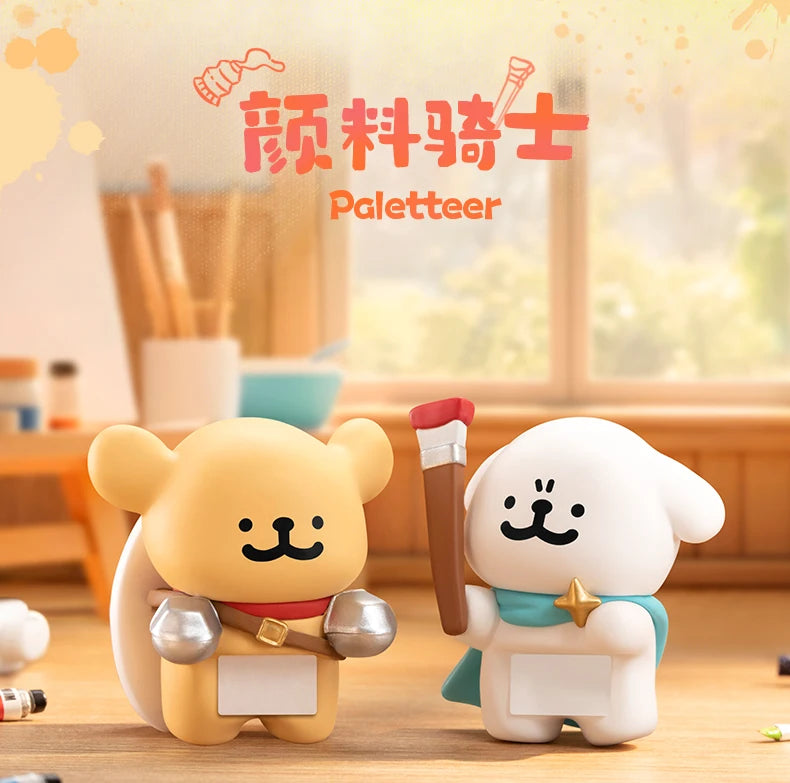 Two cartoon dog figurines with paintbrushes on a wooden surface, featuring the brand 'Paletteer'.