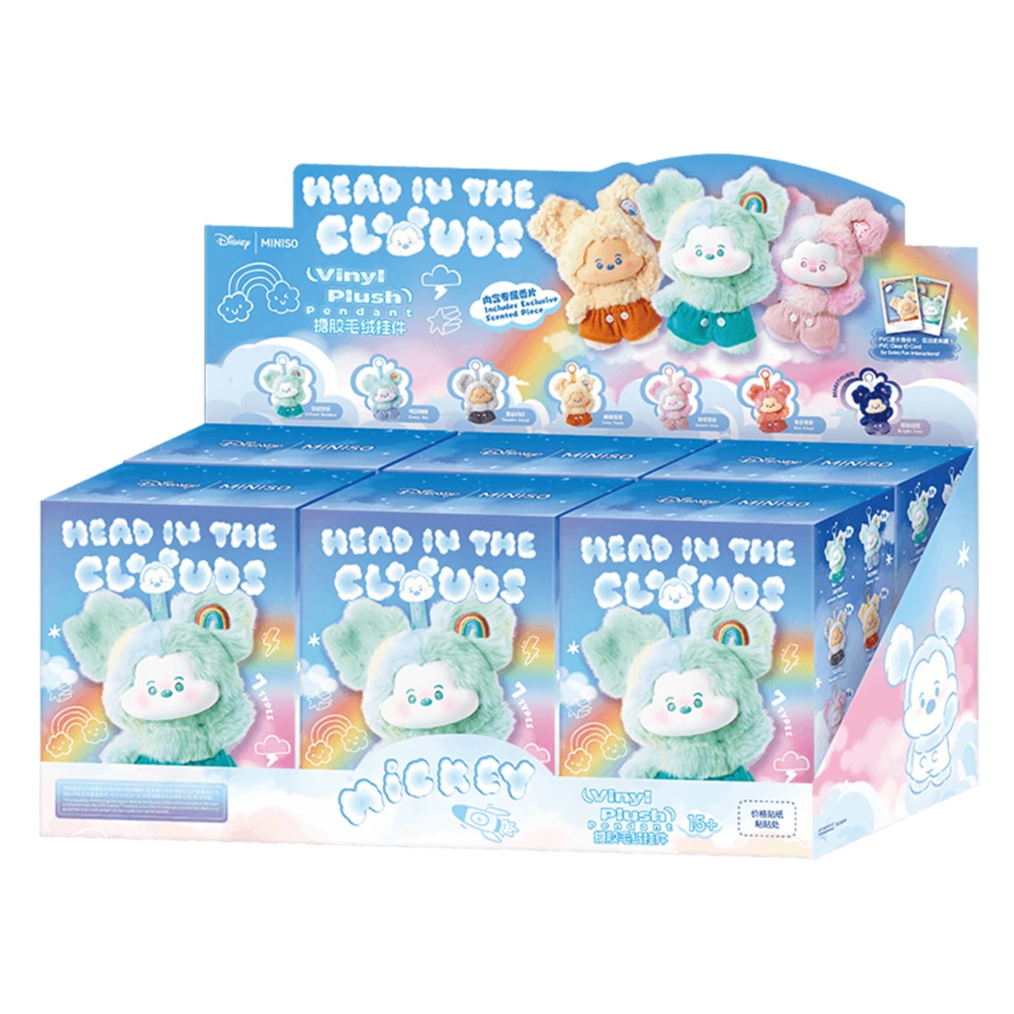 Display of 'Head in the Clouds' vinyl plush toys with colorful packaging.