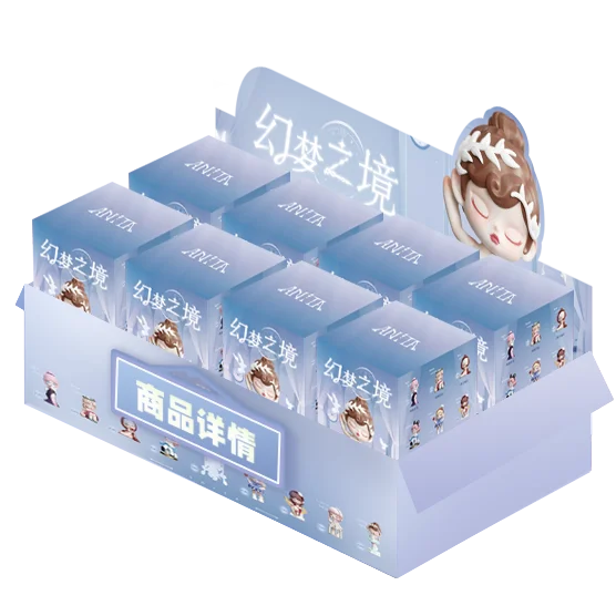 Display of '幻梦之境' boxes with a small figurine on a white background