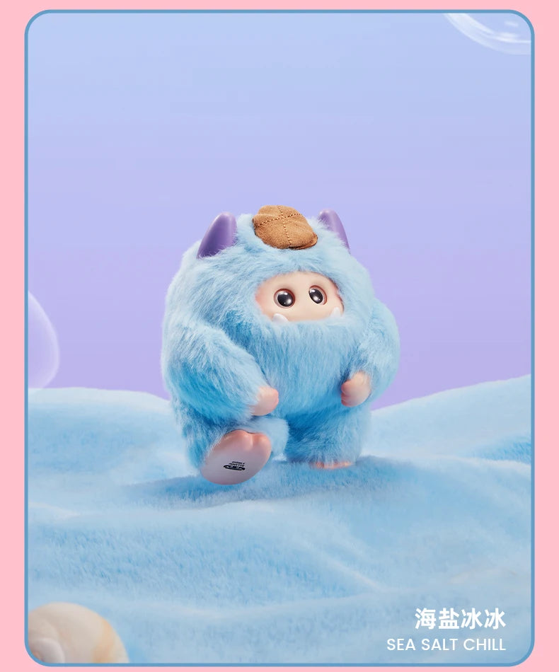 Blue plush toy with a shell on a light blue background