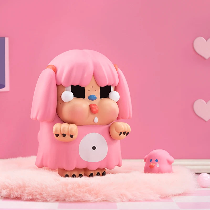 Cute pink character with large eyes and pigtails on a pink background