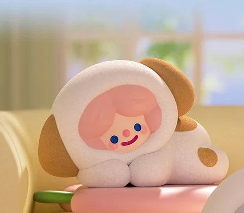 Plush toy shaped like a cartoon character with a smiling face on a blurred background