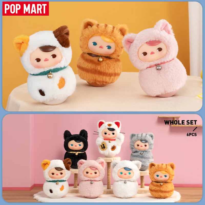 Set of plush toys in animal costumes with Pop Mart branding on a yellow and pink background.