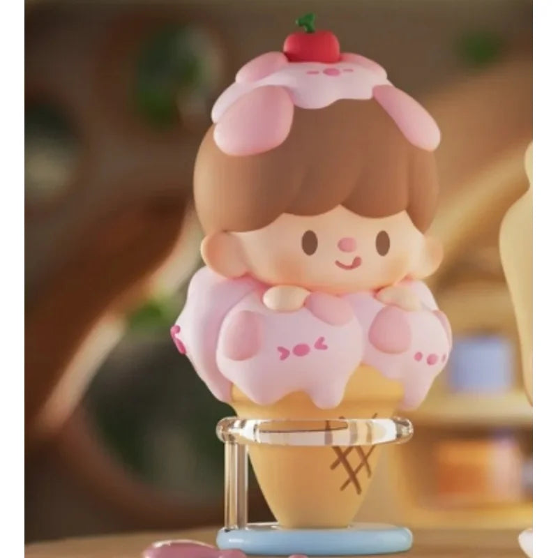 Cute character figurine shaped like an ice cream cone with a blurred background