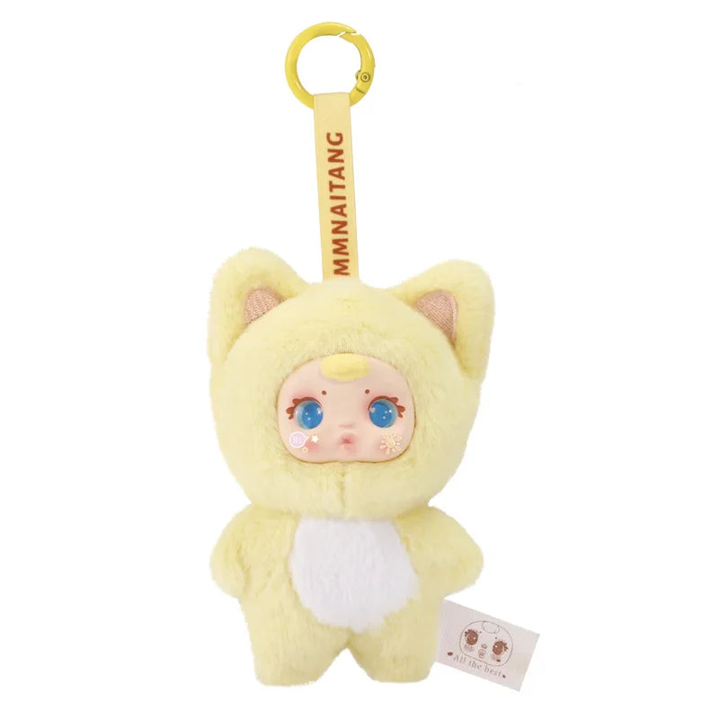 Plush toy with cat ears and a character face, attached to a yellow clip with 'MMNAITANG' branding.
