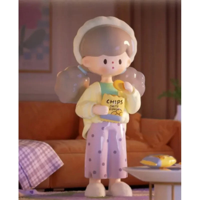 Toy figure of a character with angel wings holding a box labeled 'Chips' in a cozy room.