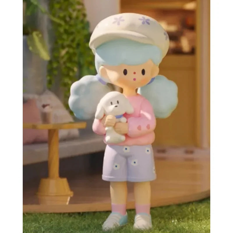 Figurine of a girl holding a dog in a garden setting