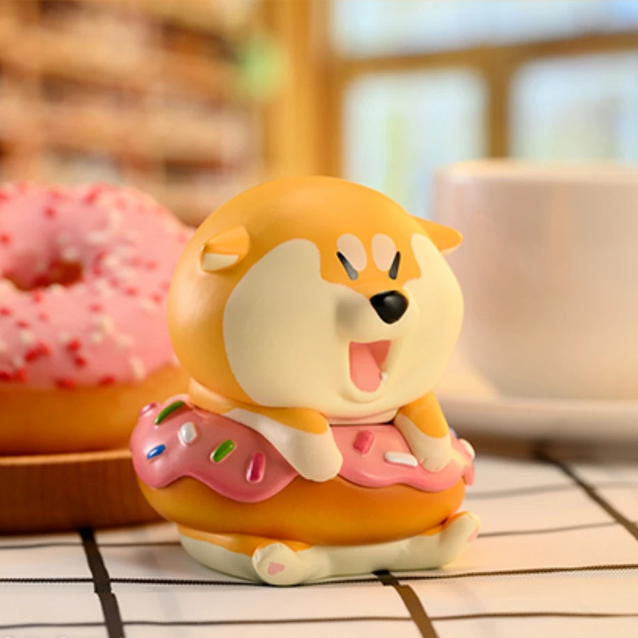 Cute dog-shaped night light with a donut design on a table.