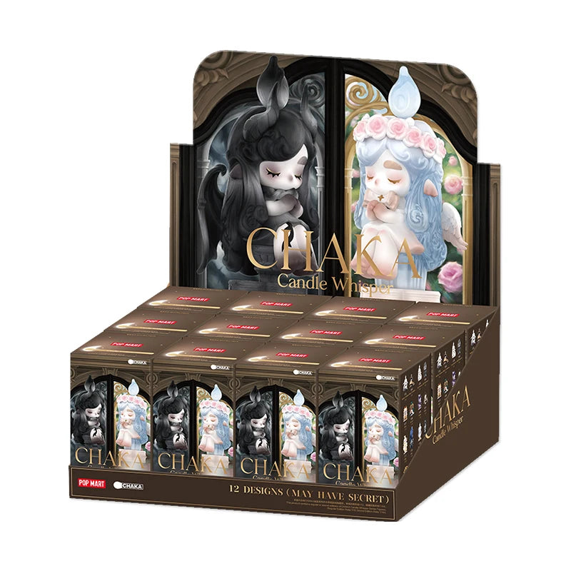 Display of Chaka Candle Works candles with artistic packaging on a white background