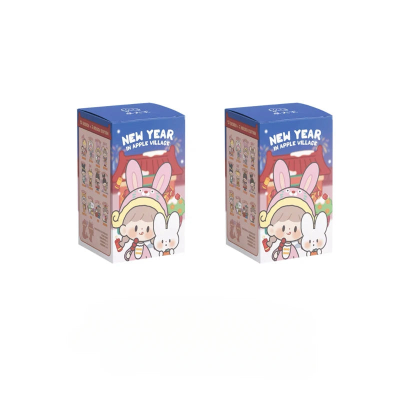 Two boxes of 'New Year in Apple Village' with cartoon characters on a white background