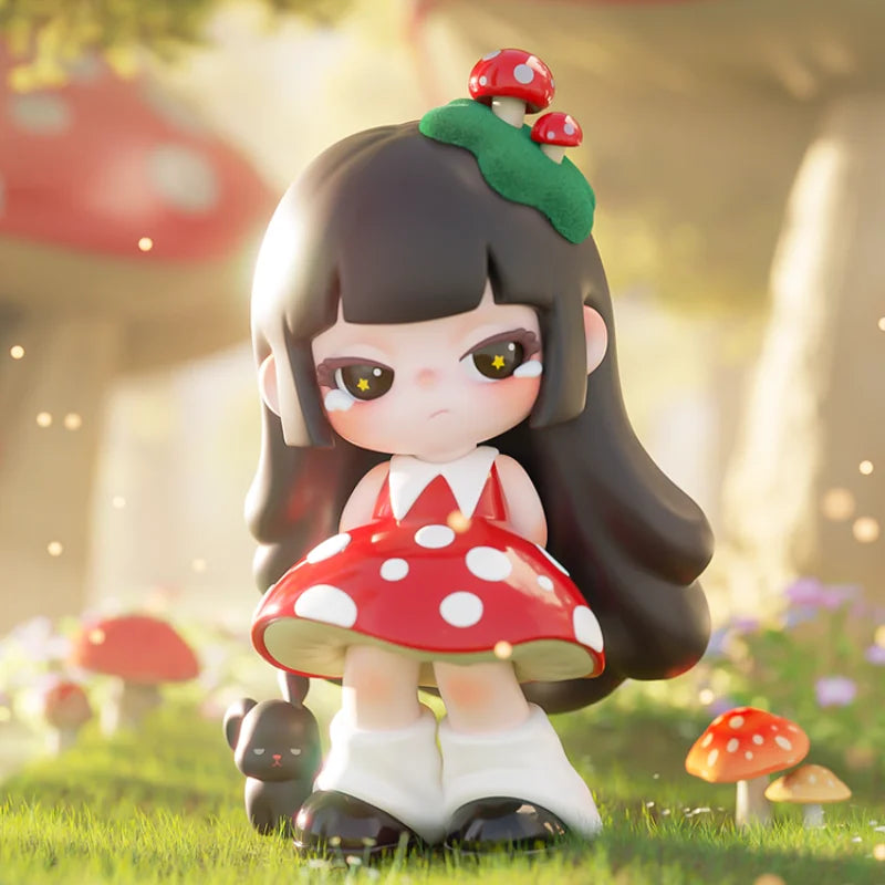 Toy figure of a girl in a red dress with white polka dots, standing in a garden with mushrooms.