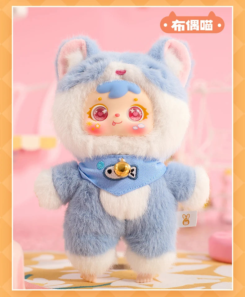 Plush toy with blue and white outfit on a pink background