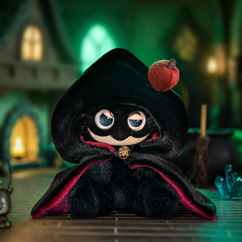 Plush toy with a black hood and red accents in a mystical setting