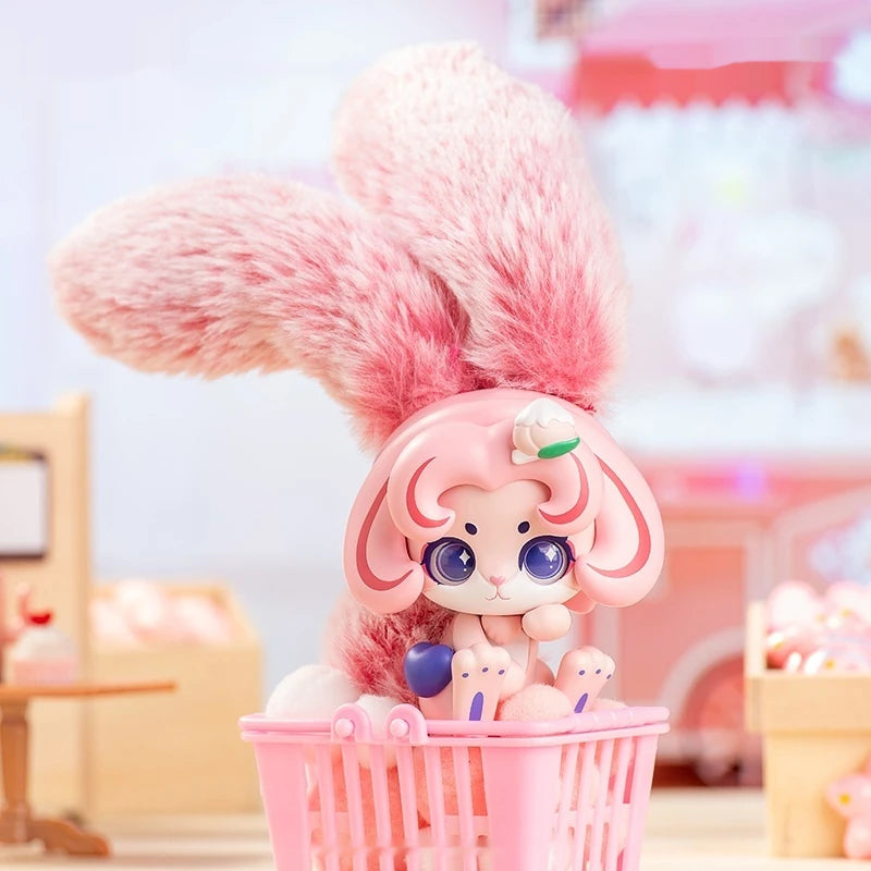Toy figure with pink hair and a basket of small figures on a colorful background