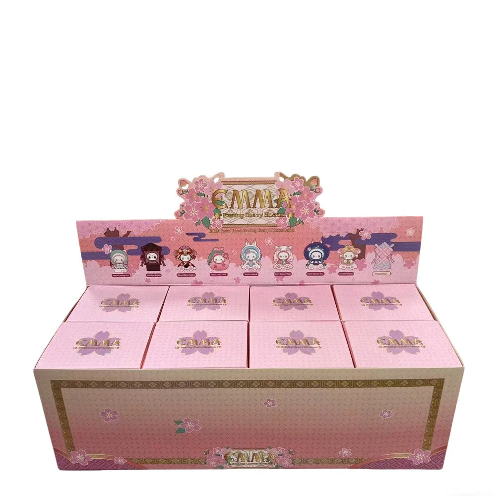 Box of 8 cartoon figurines with a pink and gold design on a white background.