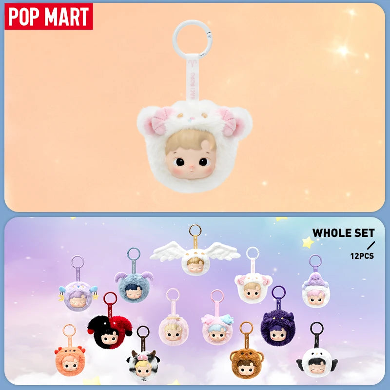 Set of small plush toys with animal-themed designs on a gradient background, featuring the Pop Mart brand.