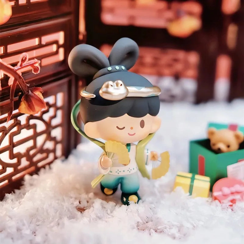 Toy figure of a character with rabbit ears and traditional attire on a decorative background