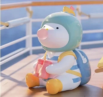 Toy figure of a character with a helmet and backpack sitting on a surface with a blurred background