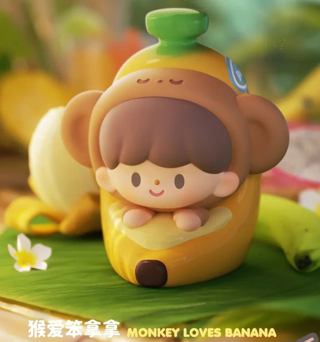 Toy figure of a monkey inside a banana with a green background