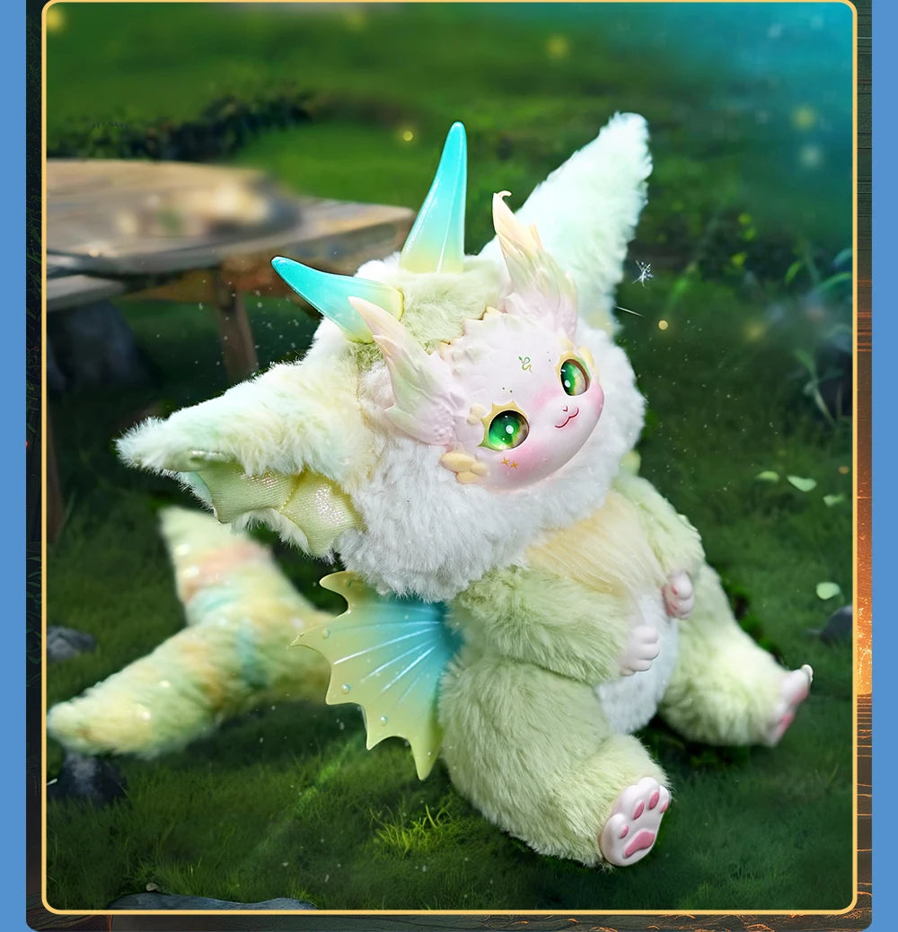 Plush toy with angelic design on a grassy background