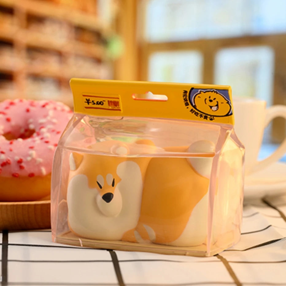 Cartoon dog-shaped container with a yellow label on a blurred background