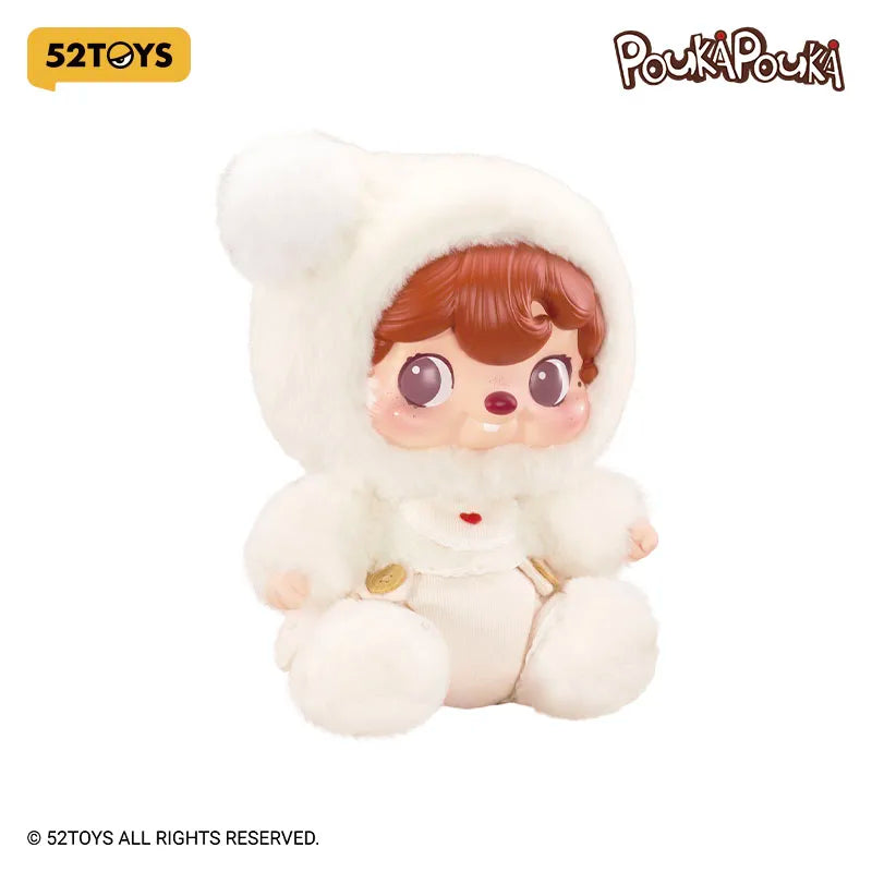 Plush toy of a character in a white outfit with 52Toys and Poukapouki branding.