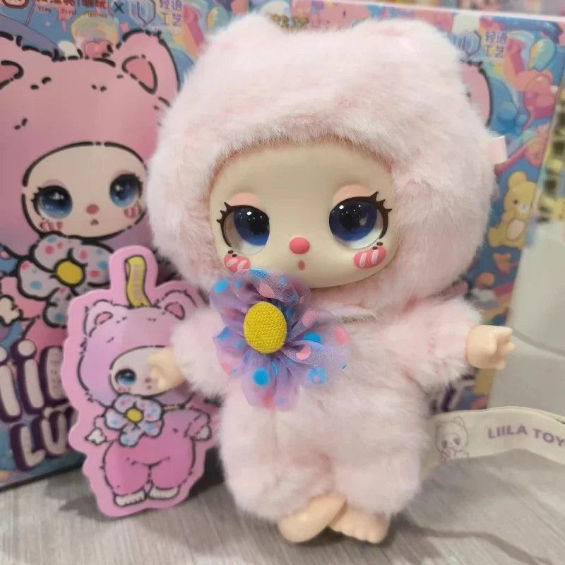 Kawaii-style doll in a pink outfit with a flower, surrounded by colorful packaging.