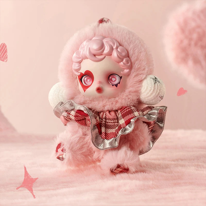 Toy figure with pink hair and outfit on a pink background