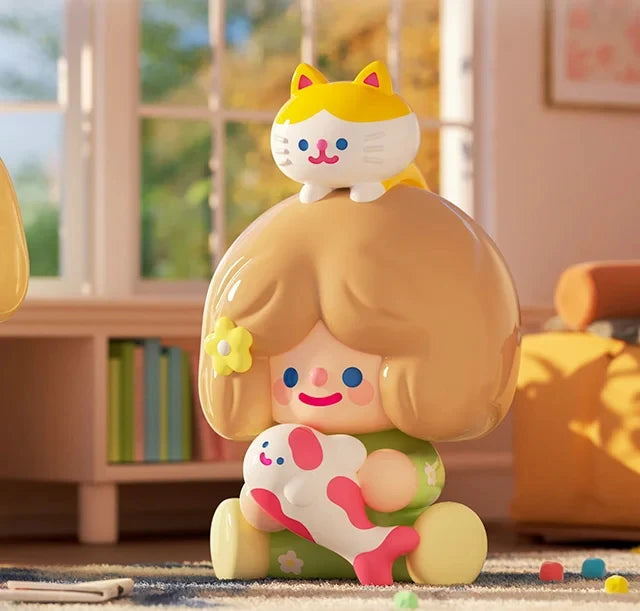 Toy figure of a girl with a cat on her head in a room setting