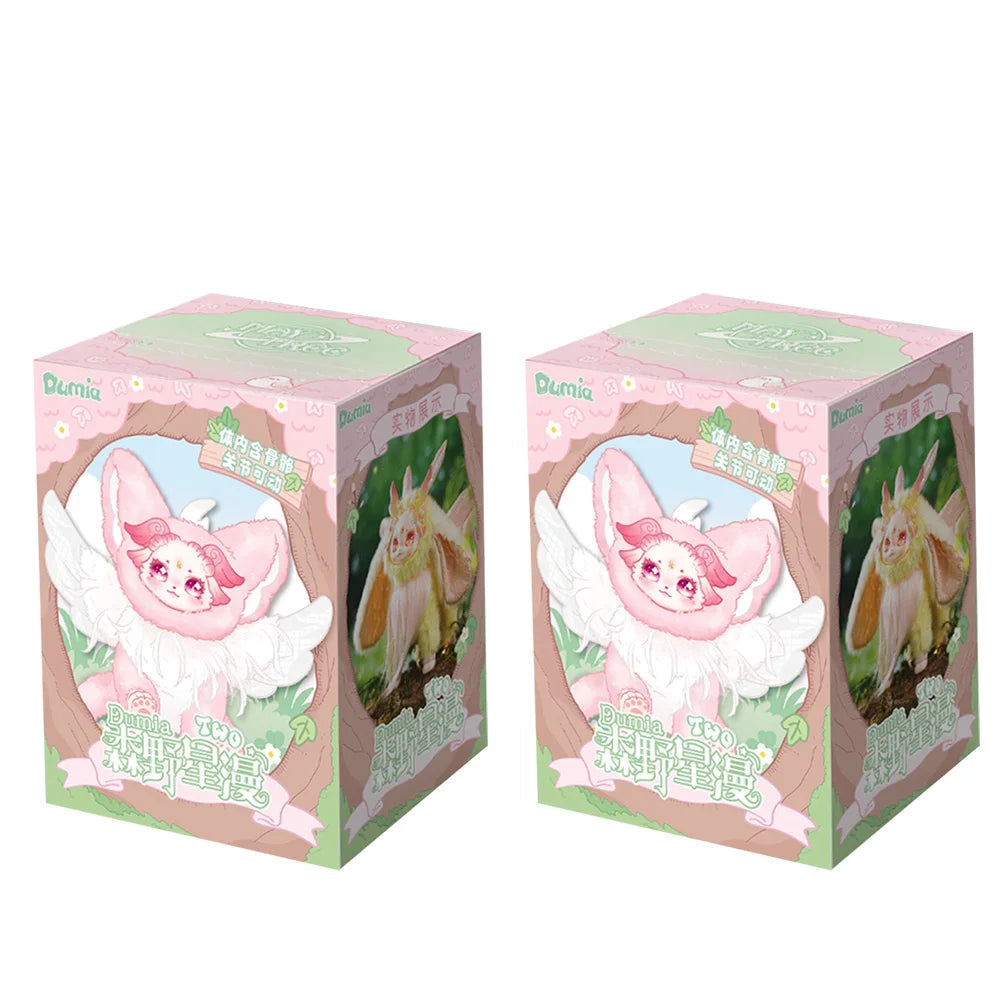 Two boxes of cartoon animal figurines with a pink and green design, labeled '2PCS'.