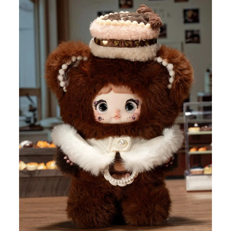 Plush toy with a brown and white outfit in a room setting