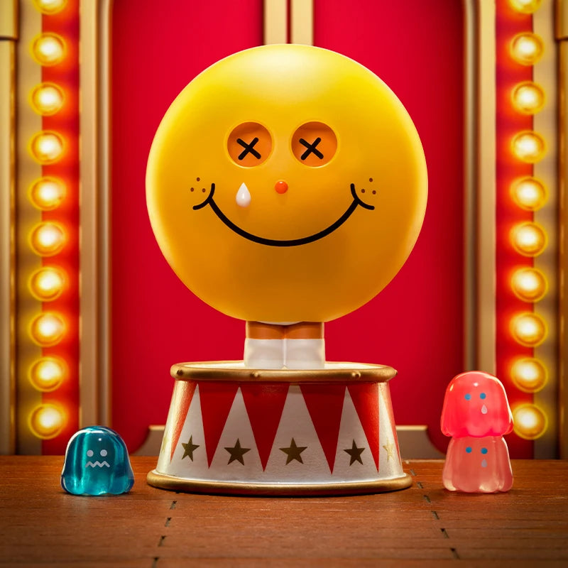 Yellow smiley face lamp with crossed eyes on a red background with lights