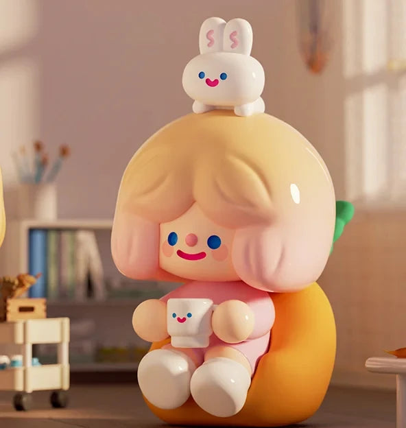 Children's toy figure with a bunny on head and a cup in hand, set against a blurred indoor background.