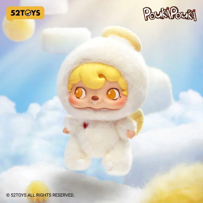 Plush toy of a character from Pouká Pouké with a white outfit and yellow hair against a cloudy sky background.