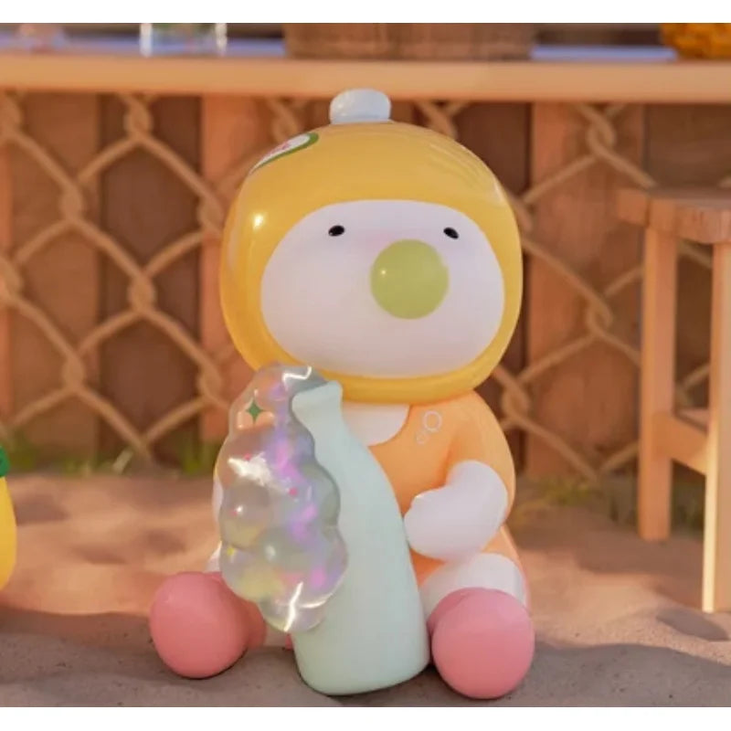 Toy figure with a yellow head, orange body, and pink legs holding a green object on a wooden surface.