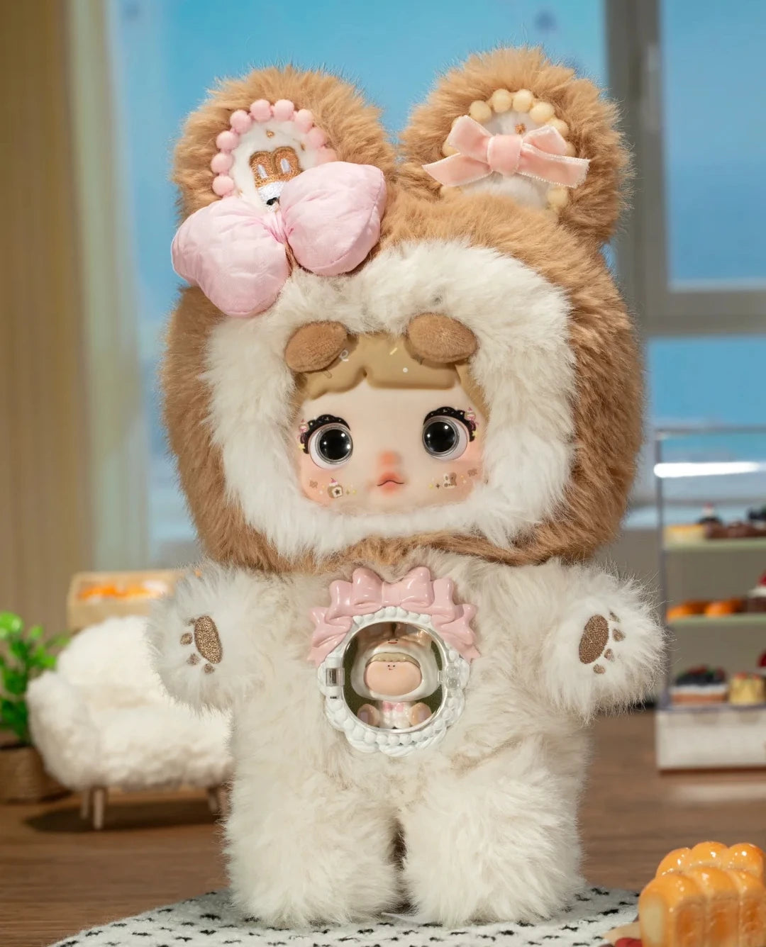 Plush toy with brown ears and white body in a room setting
