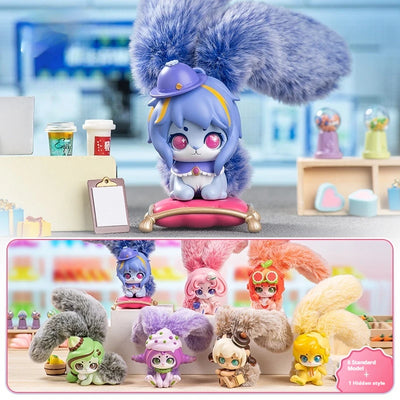 Collection of small figurines with colorful hairstyles and outfits on a blurred background.