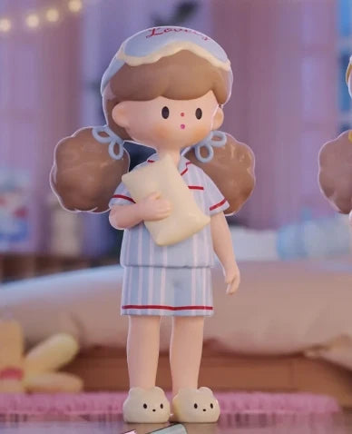 Toy figure of a girl in a uniform with a blurred background