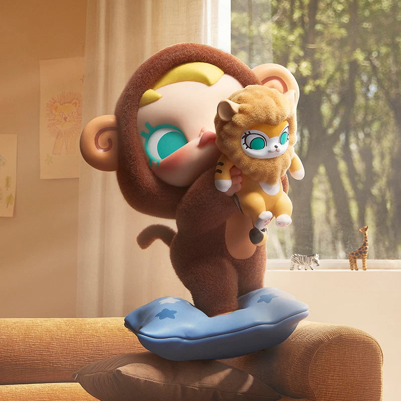 POP MART Baby Molly figure dressed as a little bear, holding her tabby cat
