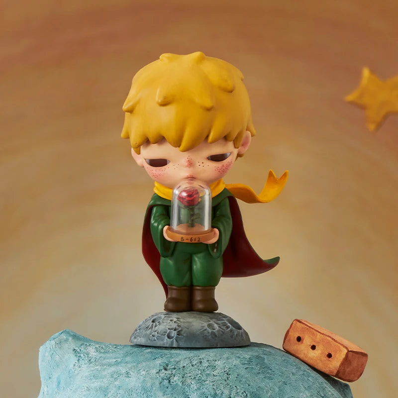 POP MART Hirono × Le Petit Prince figure with a rose in a glass case with a yellow scarf