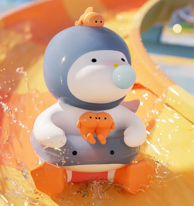 Toy penguin with a blue helmet and orange life vest in water