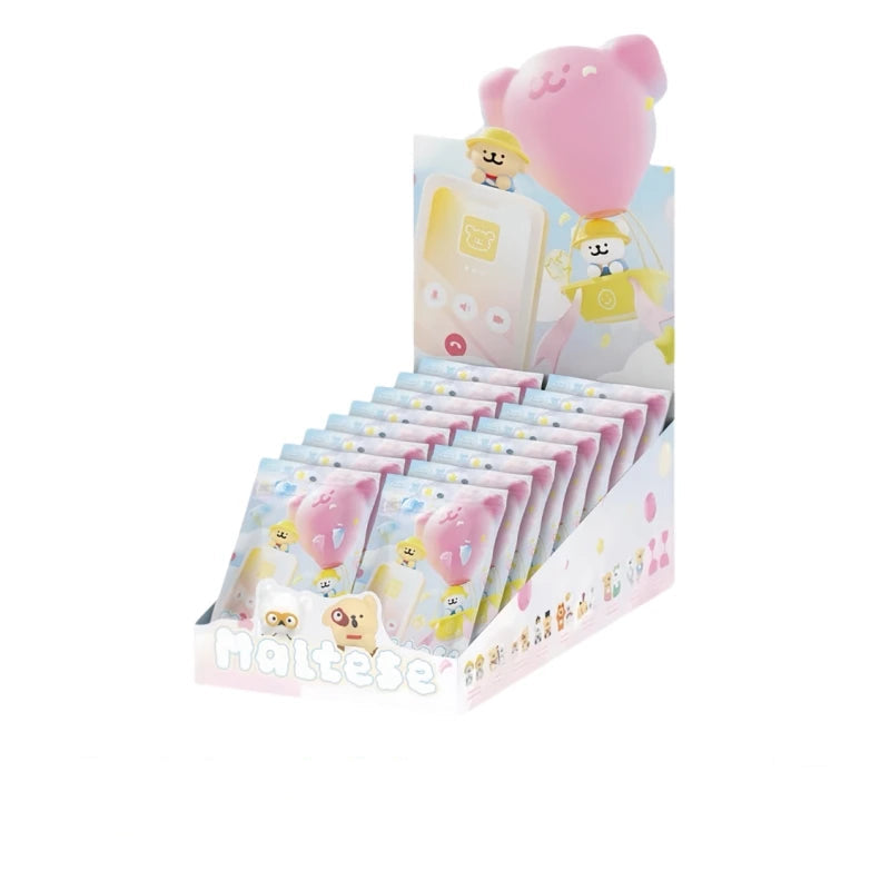 Display box with cartoon characters and a pink piggy bank, including text about package contents.