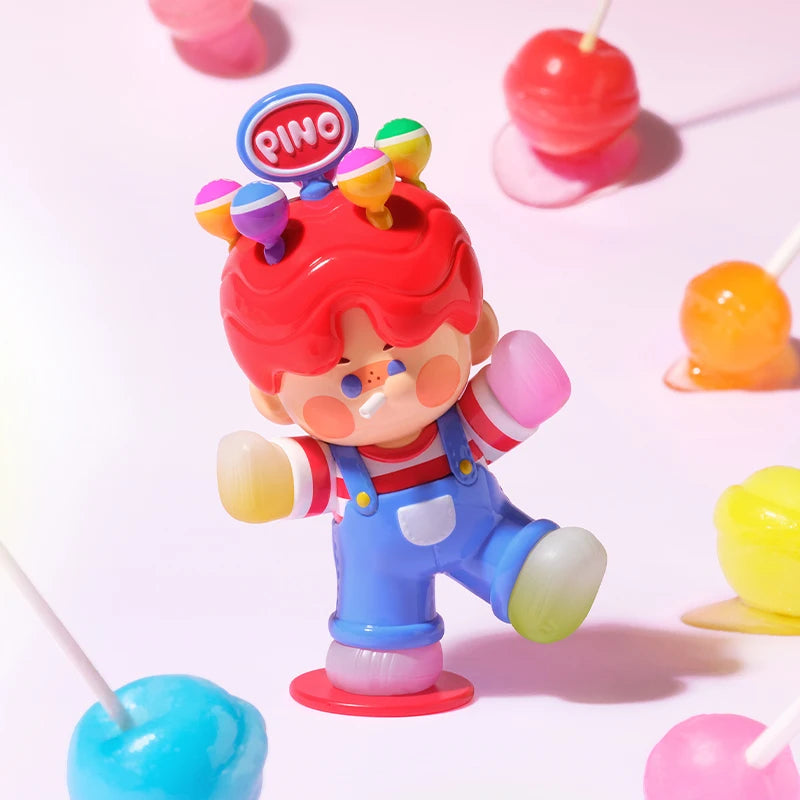 Toy figure with red hair and colorful lollipops on a white background