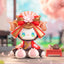 Toy figure with traditional Japanese attire in a blurred outdoor setting