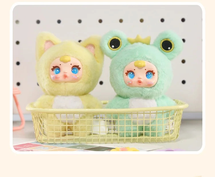 Two plush toys with animal-themed costumes in a basket against a pegboard background.