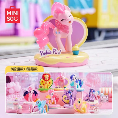 Miniature figurine of a pink pony with a Miniso logo in the background
