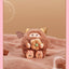 Plush toy with a small plush item on a soft surface, branded 'Mocha Coco'.