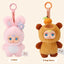 Two plush toys, one pink rabbit and one brown bear-like character, on a beige background.
