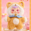 Cute plush toy with animal-like design on a pink background